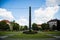 Obelisk at the Karolinenplatz in Munich at sunshine