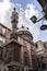 The obelisk of San Gennaro and the cupola of the chapel of San Gennaro in the historical centre of Naples, Italy