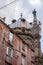 The obelisk of San Gennaro and the cupola of the chapel of San Gennaro in the historical centre of Naples, Italy