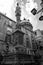 The obelisk of San Gennaro and the cupola of the chapel of San Gennaro in the historical centre of Naples, Italy