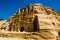 Obelisk Tomb and Bab As-Siq Triclinium ruins ancient Nabataean city Petra, Jordan near entrance to canyon Siq. Explore and