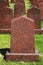 Obelisks of red granite at the military memorial