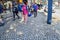 OBERAMMERGAU, GERMANY - OKTOBER 09, 2018: A group of Chinese tourists on a tiled pavement