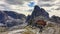 Oberbachernspitze - A panoramic view on the valley in Italian Dolomites. There is a big cottage in the middle.