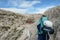 Oberbachernspitze - A woman hiking in a high and desolated mountains in Italian Dolomites.