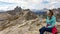 Oberbachernspitze - A woman hiking in a high and desolated mountains in Italian Dolomites.