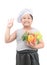 Obese boy chef with vegetables in bowl