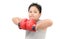 Obese boy show muscle with red boxing gloves