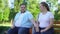 Obese couple on first date, man tenderly taking girlfriend hand, love and care