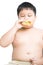 Obese fat boy child eat chicken hamburger isolated