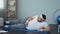 Obese male lifting leg lying on mat, healthy lifestyle, sport leisure, exercises