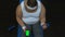 Obese man lifting dumbbell and watching fitness video smartphone, green screen