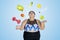 Obese woman juggling dumbbell and vegetables