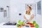 Obese woman preparing vegetable to make salad