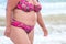 Obese woman in a swimsuit.