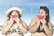 Obese women eating watermelon