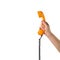 Objects Hands action - Hand holds retro orange phone red handset. Isolated