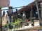 Objects of kitchen in cast iron suspended in a courtyard in Turkey.