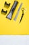 objects for male hair cutting, on a yellow background, there is a place for an inscription