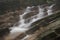 Oblique waterfall in the forest