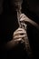 Oboe player. Hands with Music instrument closeup