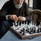 Obscure face of senior man play chess with himself