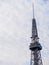 Observation deck and antenna of Nagoya TV Tower on cloudy day, Japan