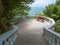 Observation deck with stairs and sea views located in the forest