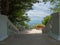 Observation deck with stairs and sea views located in the forest