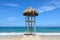 Observation post covered with dry palm leaves at the beach