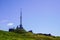 Observatory antenna and meteorological station at mountain summit of the Puy de Dome in summer blue sky