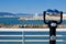 Observatory, coin operated binoculars on the pier in Versilia, vision of the beaches