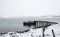 Obsolete Russia pier at Arctic ocean