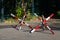 an obstacle in the form of a metal hedgehog stands on the road