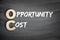 OC - Opportunity Cost acronym, business concept on blackboard