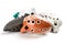 Ocarinas on white background. Orange color ocarina in glaze.