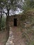 occitanie capitelle leaning against a wall and its access path