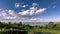 Ocean bank and grass meadow timelapse at the summer or autumn time. Wild nature, sea coast and rural field.