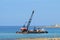 Ocean barge dredger in Cyprus clearing silt.