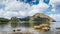 Ocean bay in front of El Nido village. Local banca boat in open lagoon. Beautiful vacation scenery. Palawan, Philippines