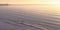 Ocean at Blacks Beach with sunset in the horizon