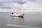 Ocean cargo ship sheltered from a storm in the bay of the port, Batumi, Georgia