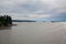 Ocean cargo ships anchored in inlet