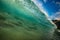 Ocean colorful bright wave with green blue water and splashed li