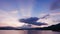 Ocean, dramatic sky with flying kite