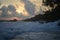 Ocean foamy waves at sunset