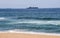 Ocean Liners Anchored Offshore with Beach in Foreground