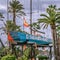 Ocean Race Sailboat monument on roundabout place with palms around, street in central Alicante, close up photo, ALICANTE, SPAIN -