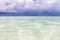 The ocean before the rain. Summer juicy seascape. The Caribbean Sea with turquoise water, .