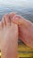 Ocean scene lovers feet